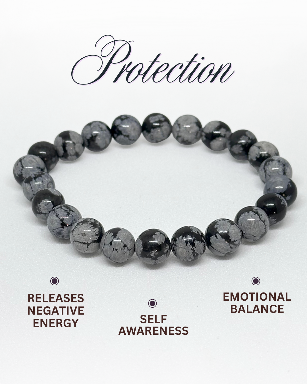 Gray beaded Snowflake Obsidian bracelet on a white background with text about its benefits.
