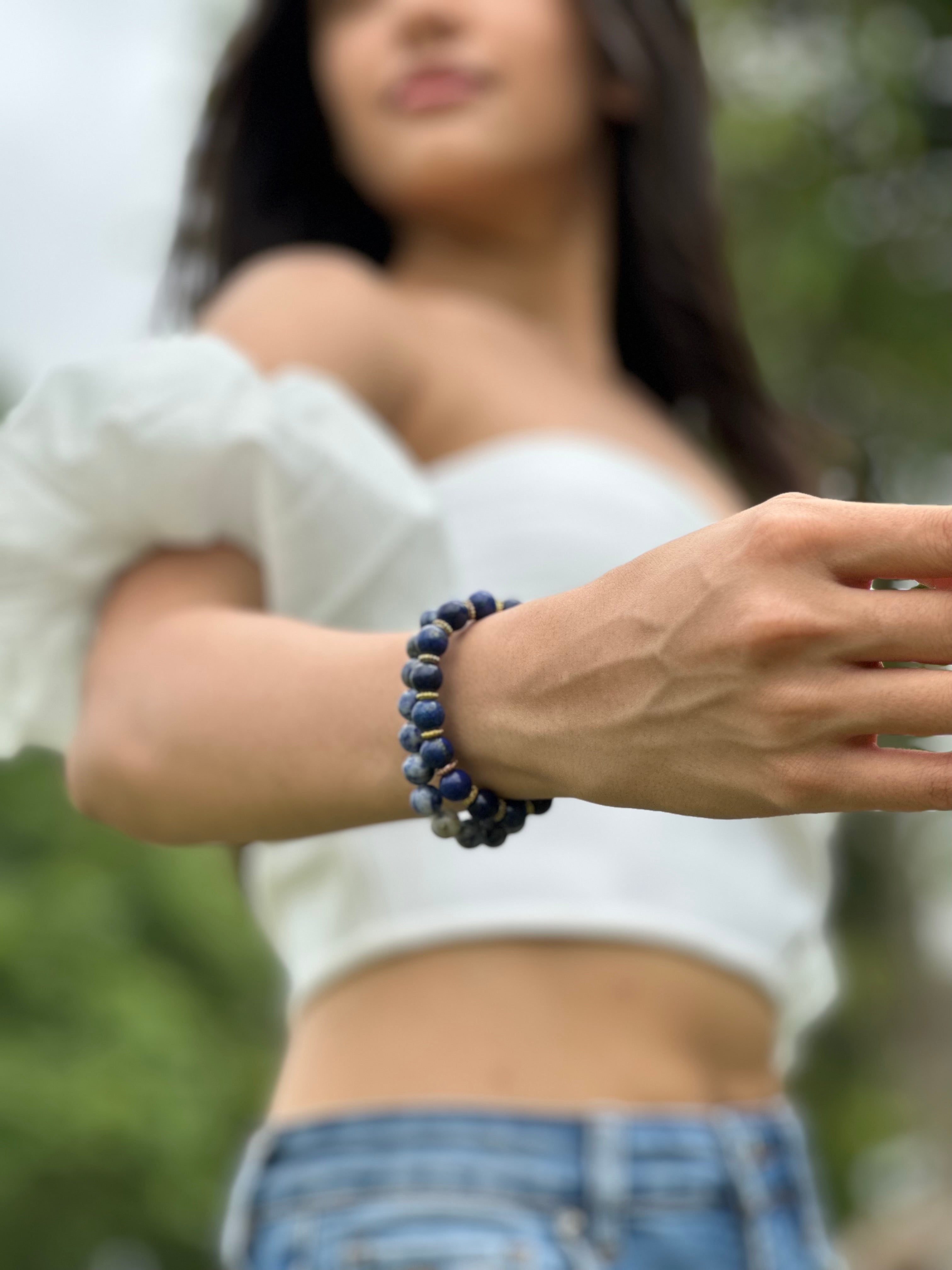 Person wearing a Lapis 8mm bracelet